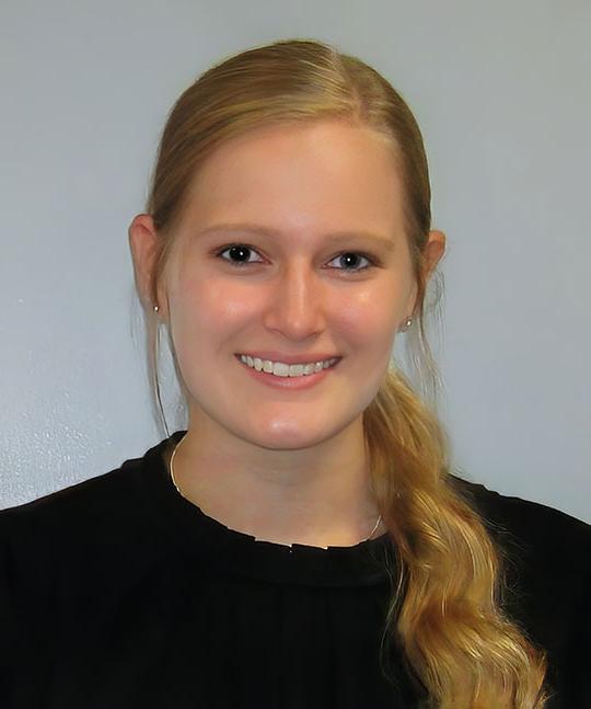 headshot of woman with long blond hair